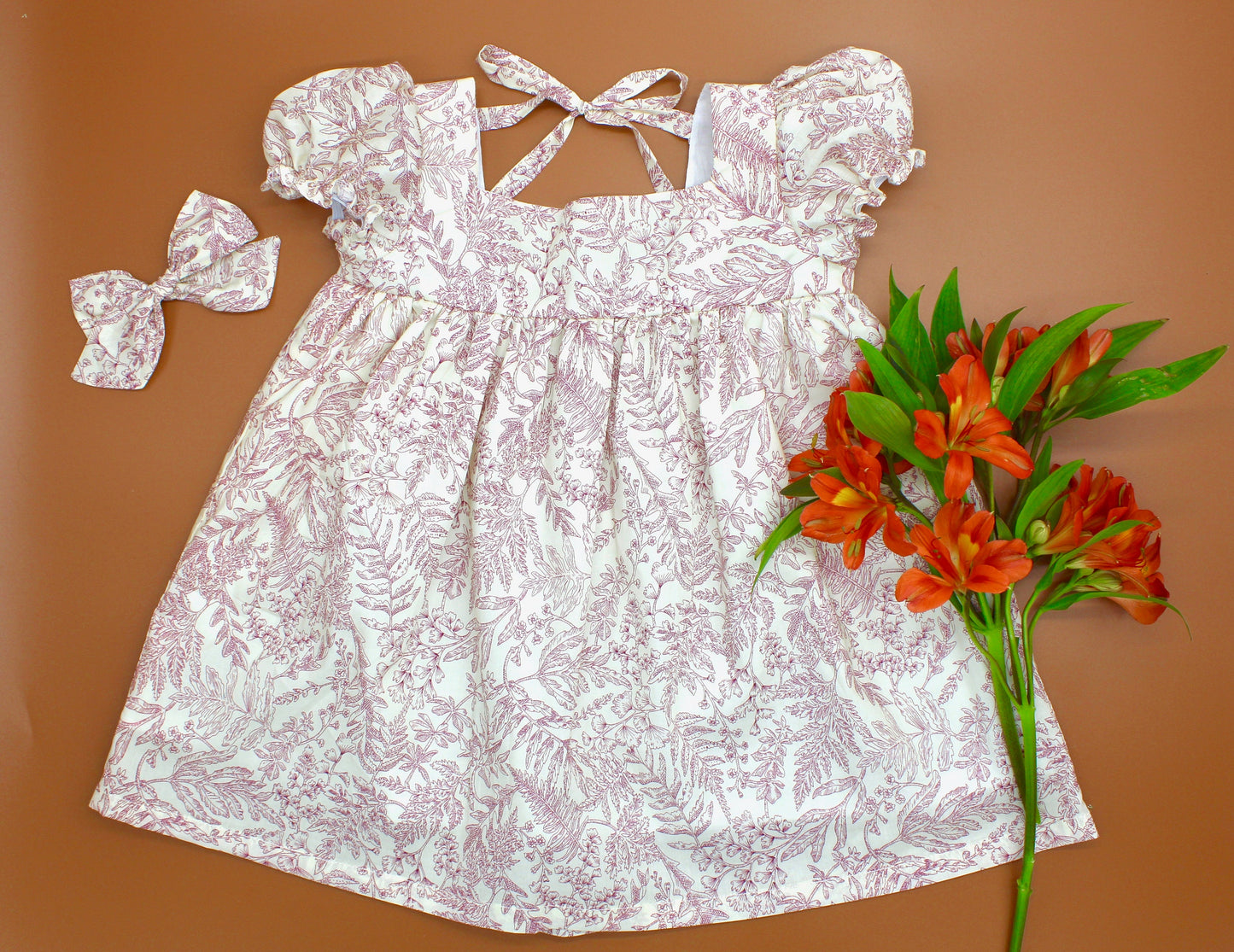 Liberty London dress for little girl with Square Neck and Short Puffy Sleeves.