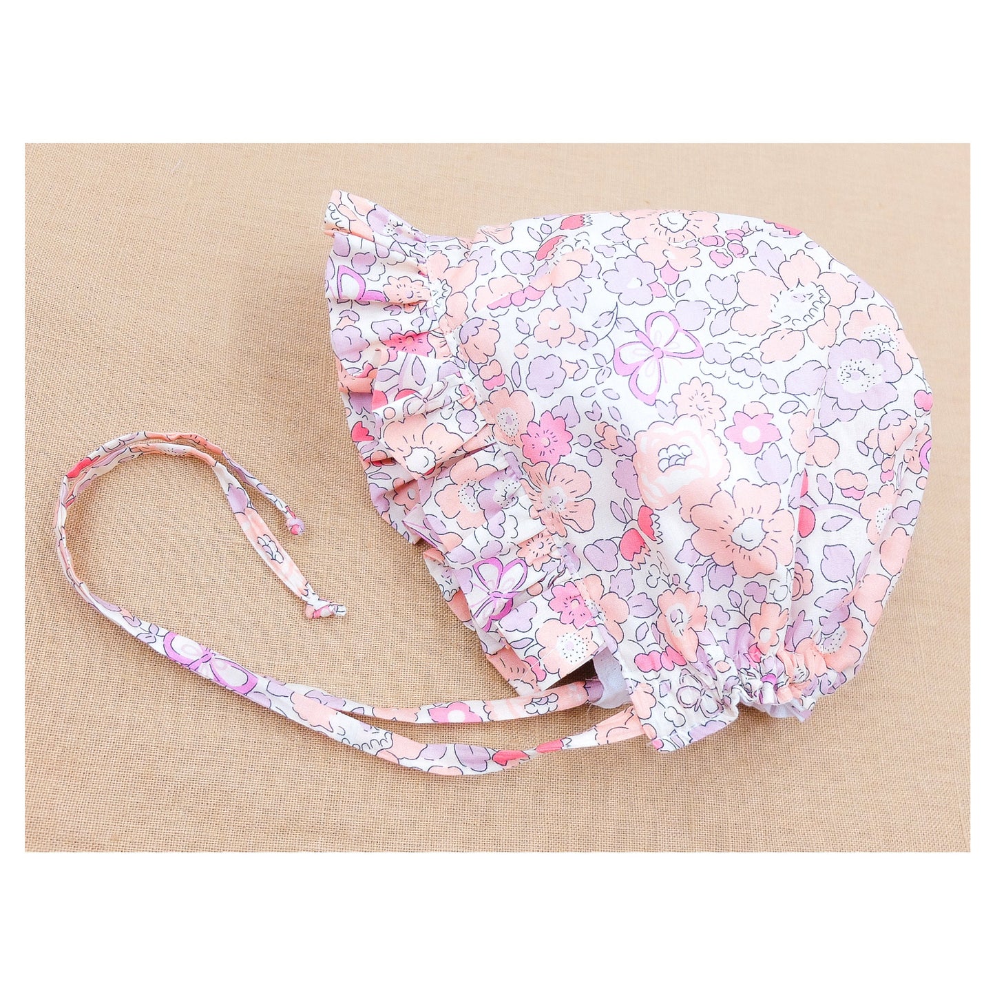 Liberty of London reversible linen baby bonnet