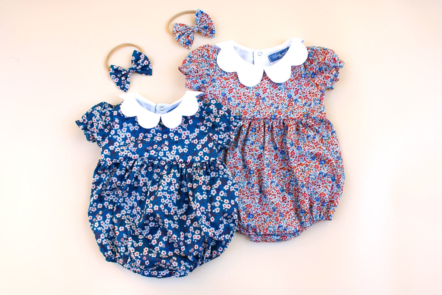 Liberty London baby bubble romper with short sleeves and scalloped collar