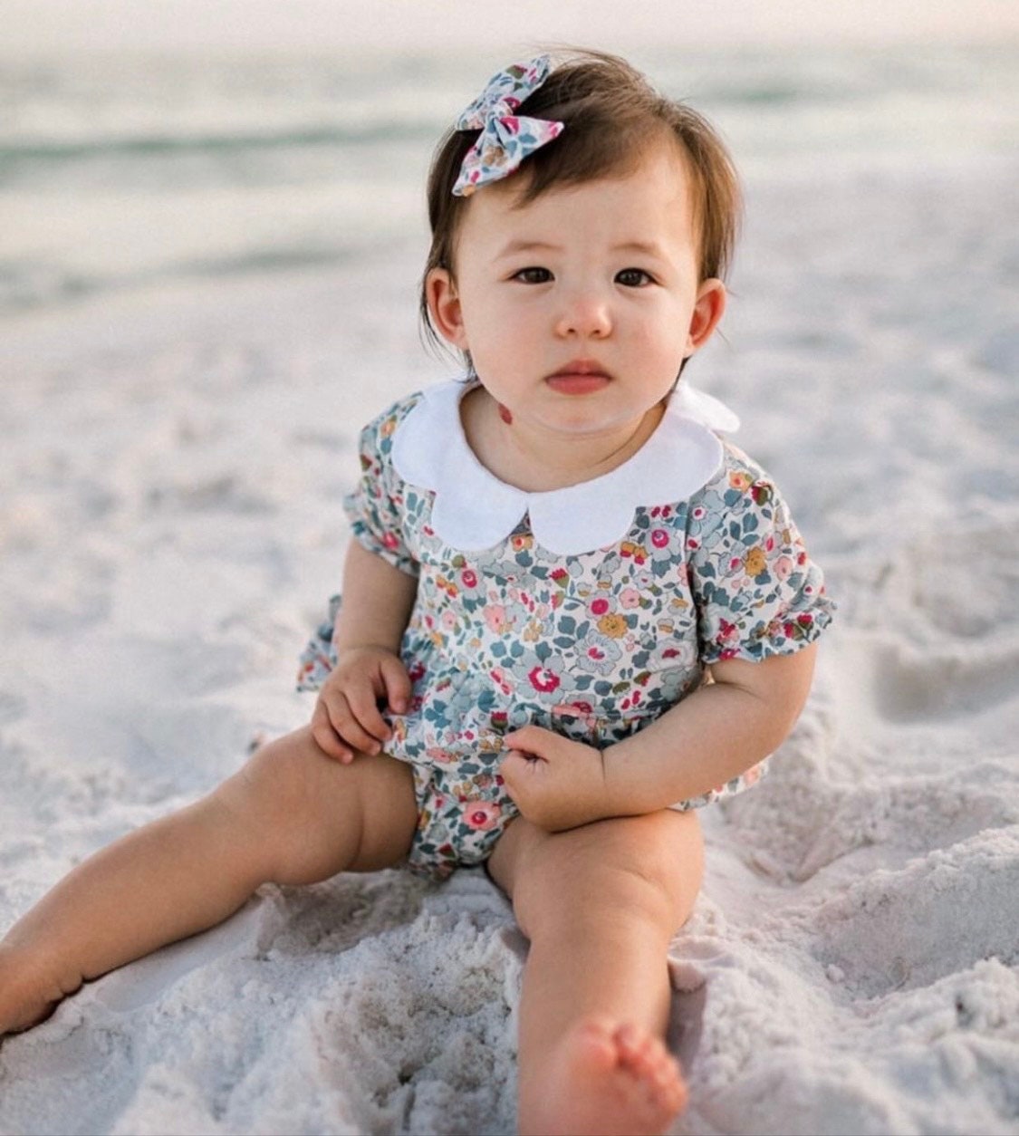 Liberty of London baby bubble romper with short puffy sleeves and scalloped collar - Floral print summer baby romper